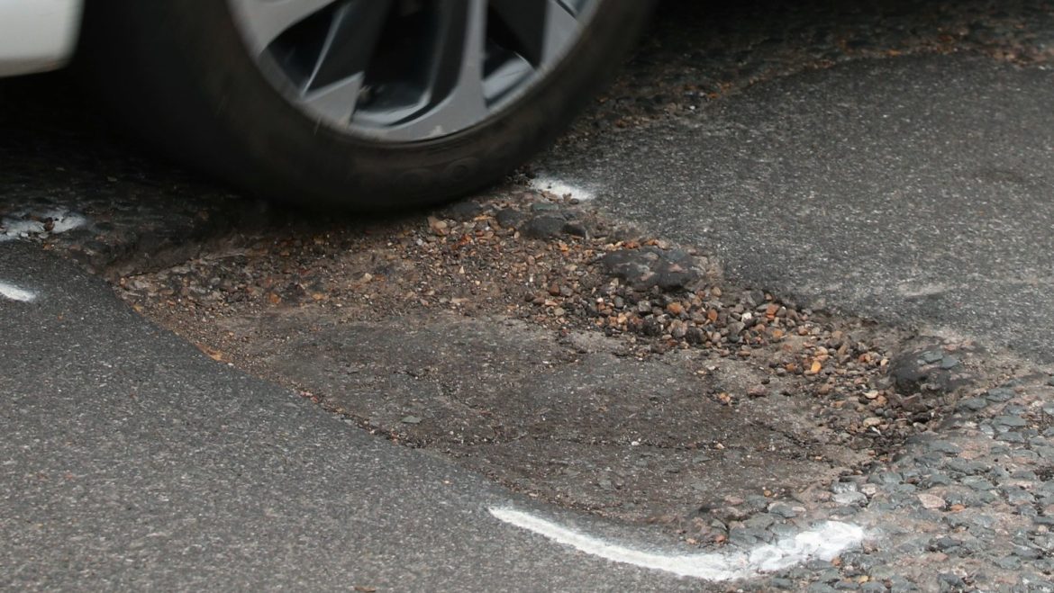 PM urges councils to ‘get on’ with fixing ‘broken roads’