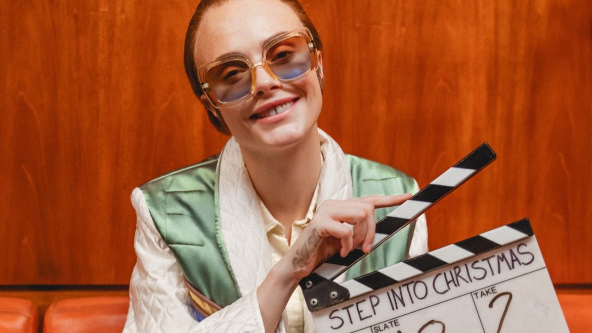 Cara Delevingne plays Elton John in Step Into Christmas video