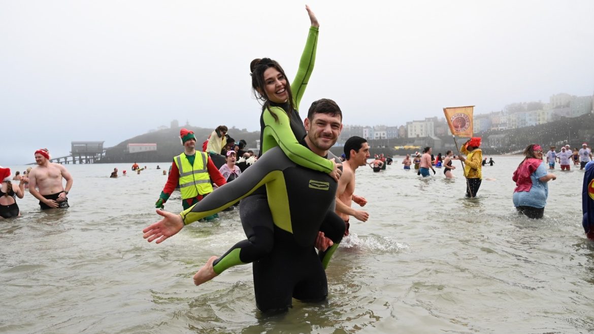 Romantic proposal makes waves at Tenby Boxing Day swim