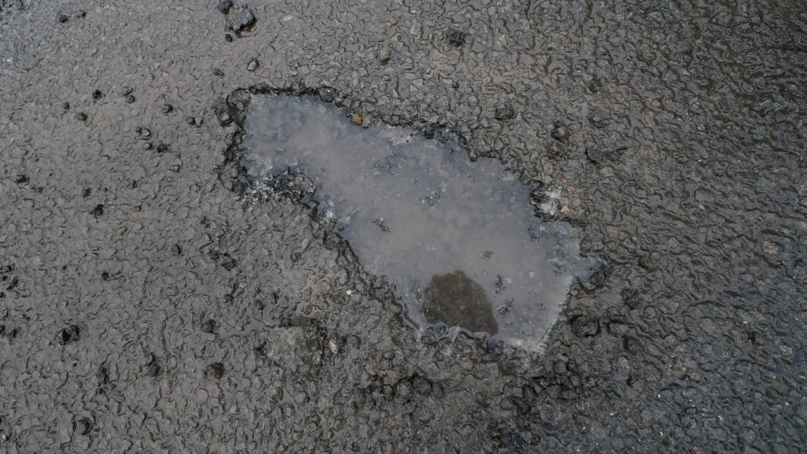 Commons committee chairman says local roads are ‘riddled with potholes’