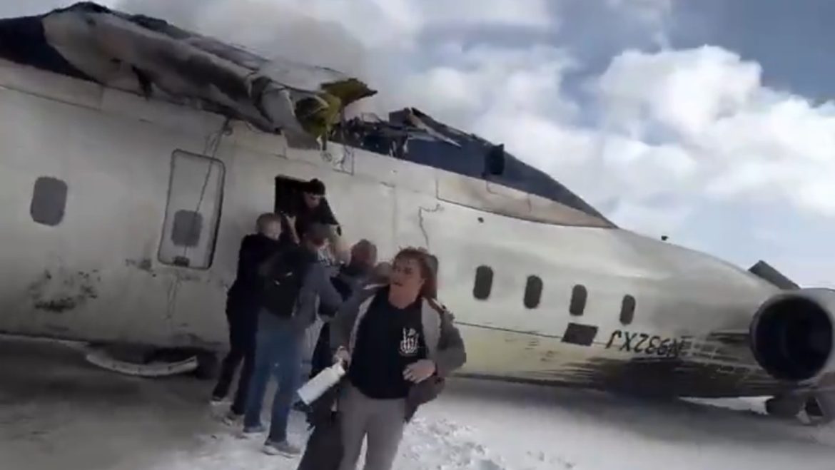 A Delta plane crashed and flipped over on landing at Pearson International.