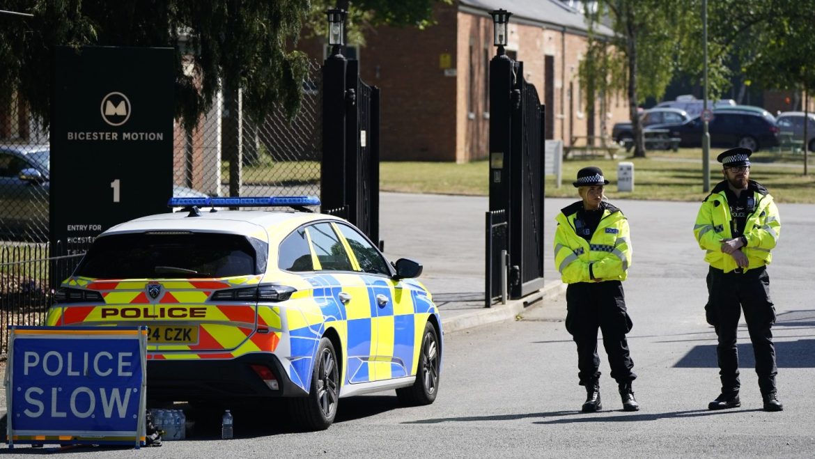 Two firefighters and a member of the public have died after a fire at a former RAF base in Bicester