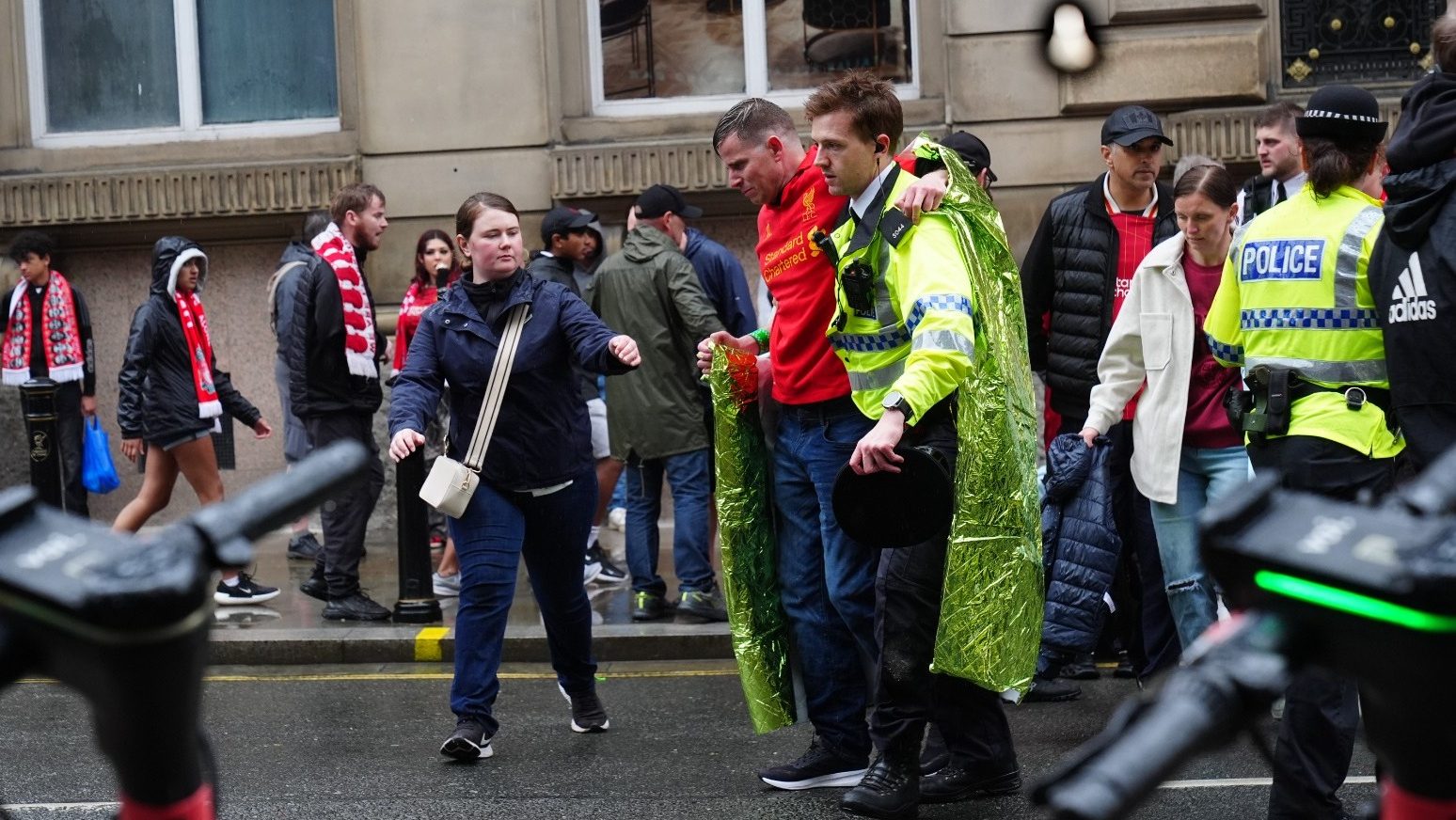 Man detained after car collides with pedestrians during Premier League parade