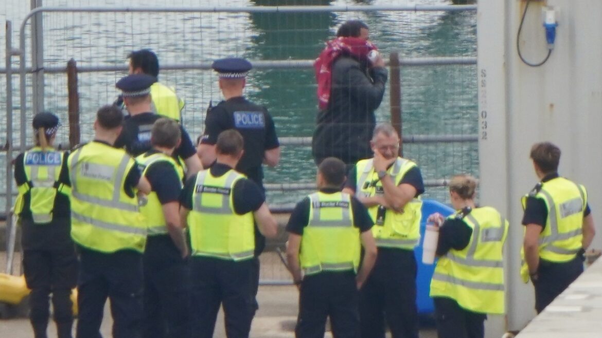 First migrants detained under ‘one in, one out’ deal as PM vows to secure border