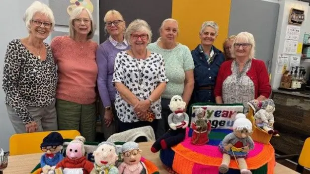 Postbox toppers celebrate charity anniversary
